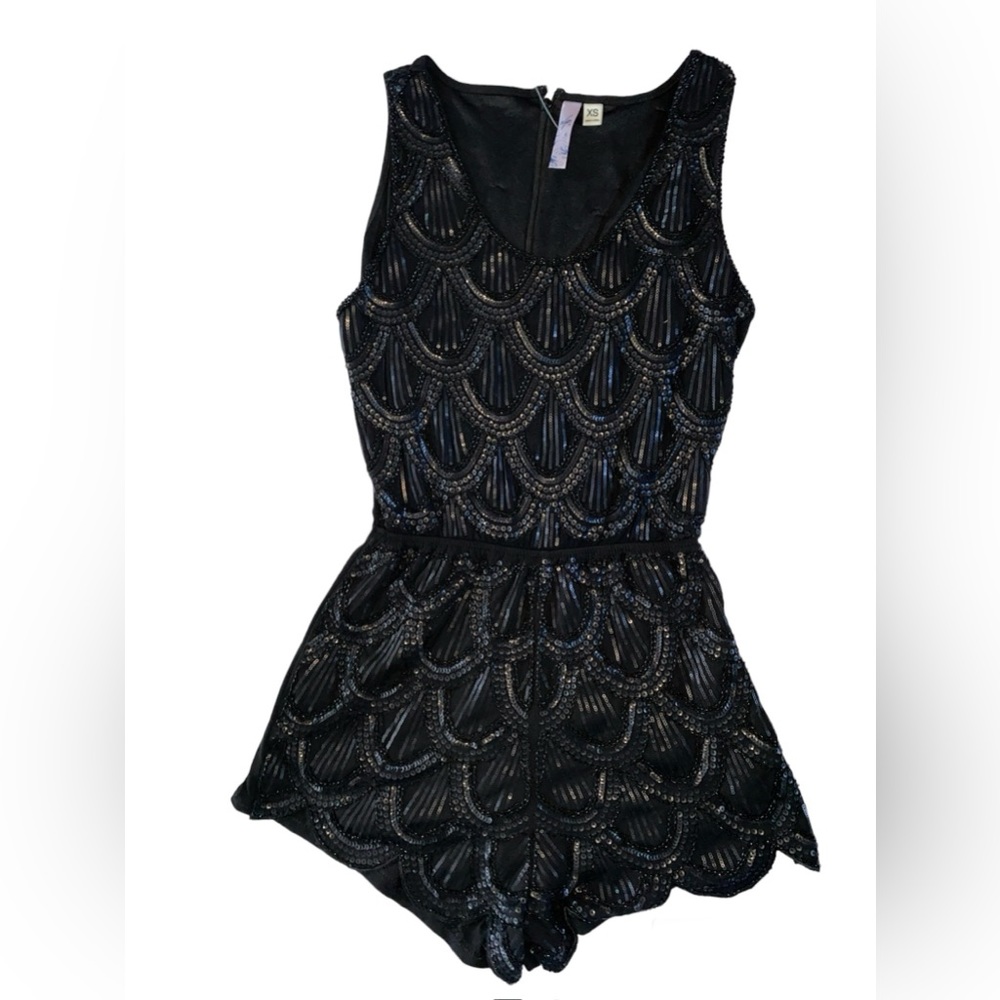 Francesca’s size XS beaded romper new with tags
